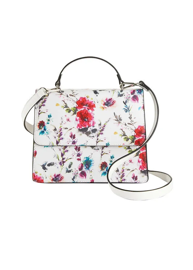 Bolso de mano blanco con flores