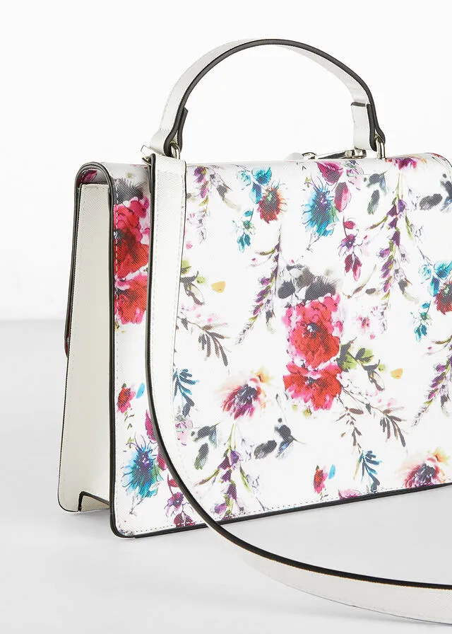 Bolso de mano blanco con flores