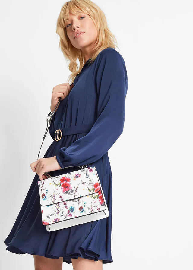Bolso de mano blanco con flores