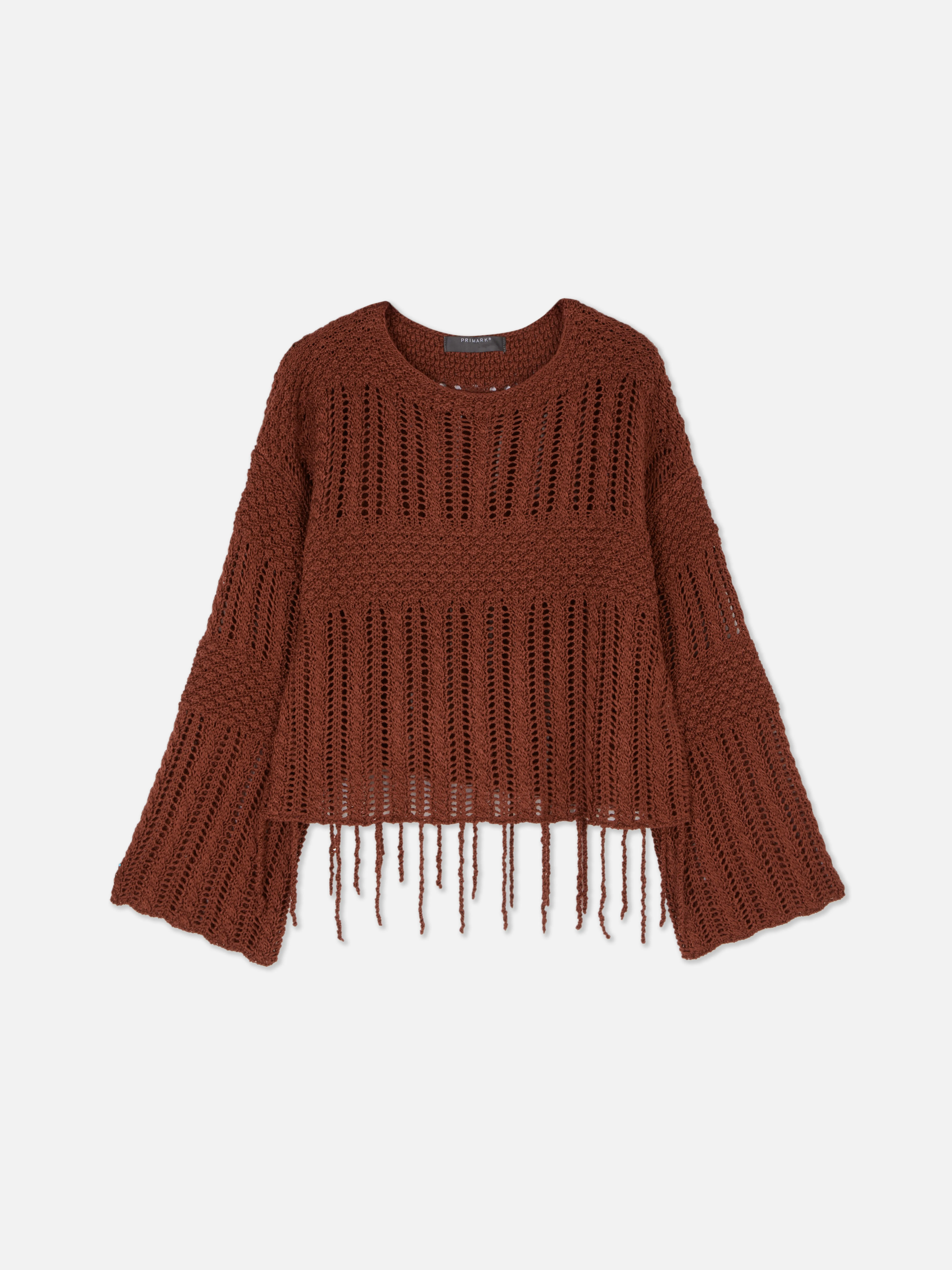 Jersey de crochet con borlas